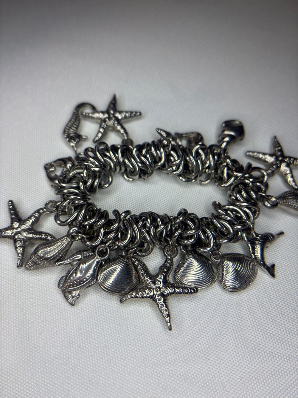 🐚 silver cha cha star fish and shell silver stretch bracelet